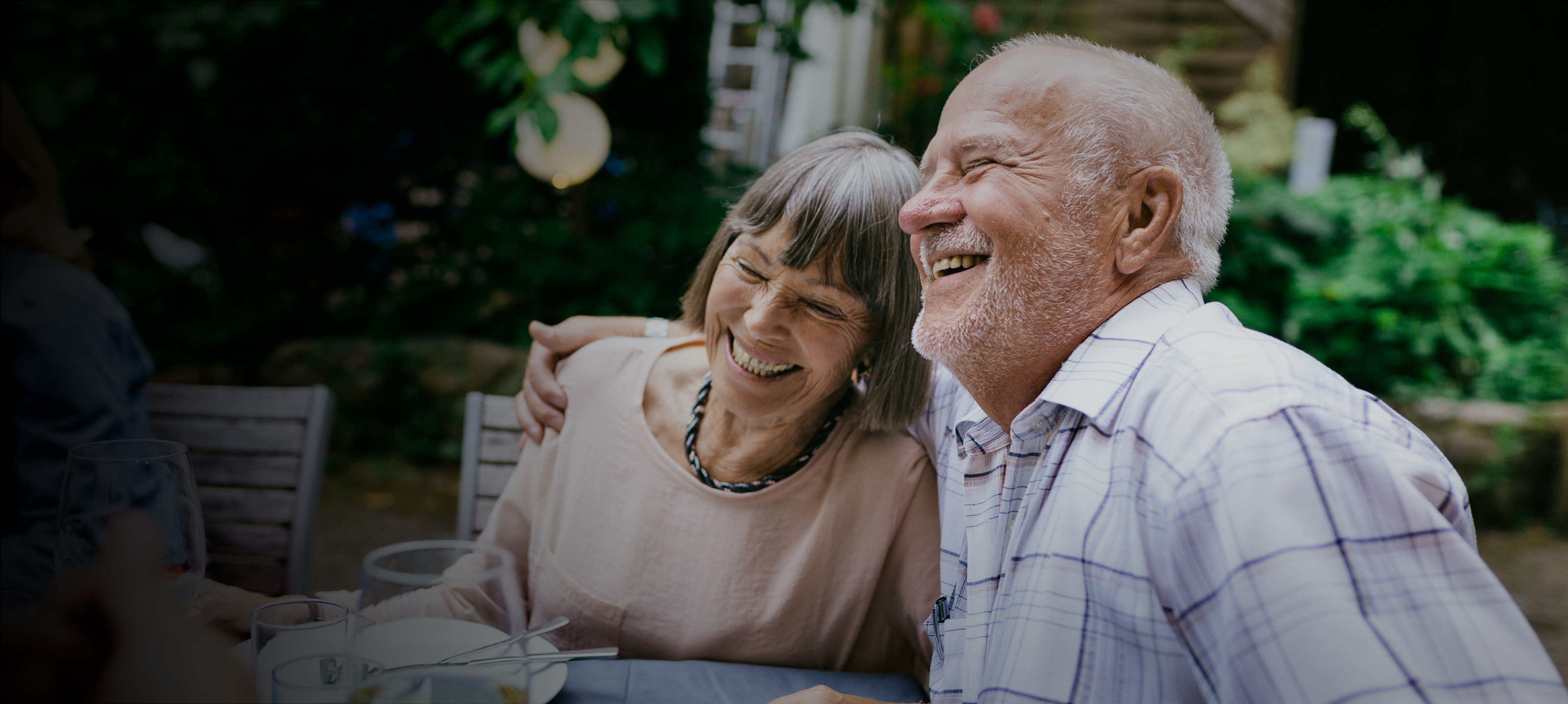 Elderly couple laughing